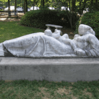 Reclining Mother and Child in front of the Roswell Library<br/> By Steffen Thomas, c. 1960 (Given in 1972) Reclining Mother and Child